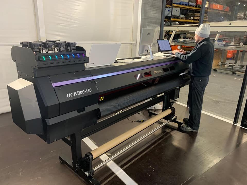 YPS engineer setting up a Mimaki UCJV300